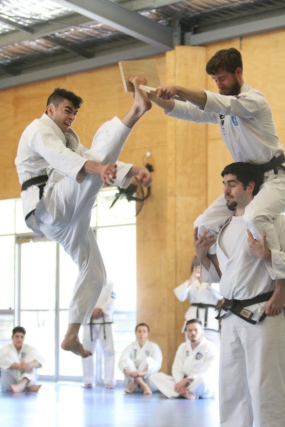 jumping kick performed in brisbane taekwondo class